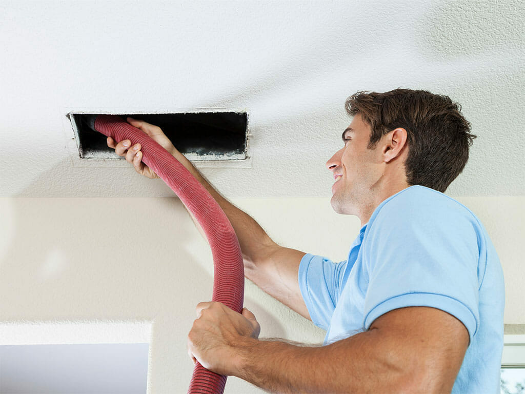 men doing a job of duct cleaning
